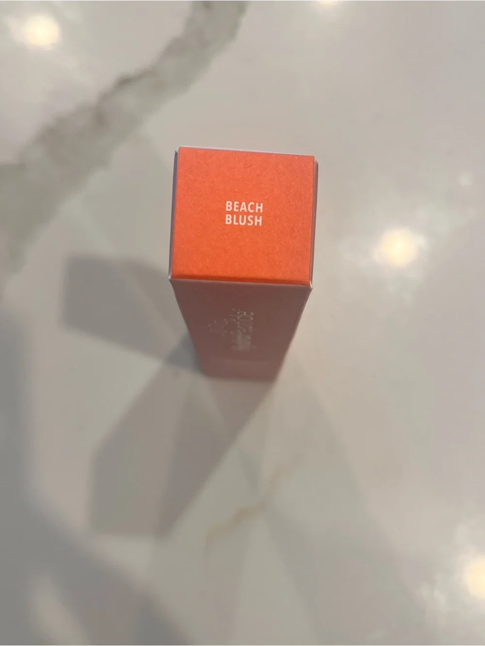 HydroPeptide Lip Gloss in Coral Peach